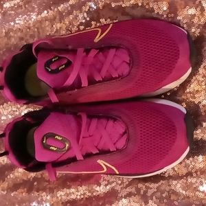 Kids. Dark pink nike shoes